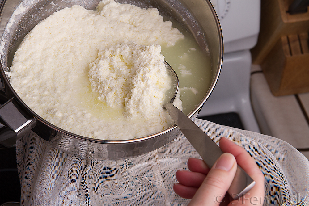 Mascarpone - spooning the curds into cheese cloth